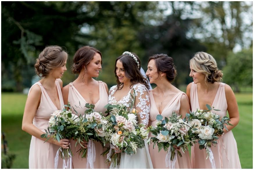 Bride and Bridesmaids in pink bridesmaids dresses 