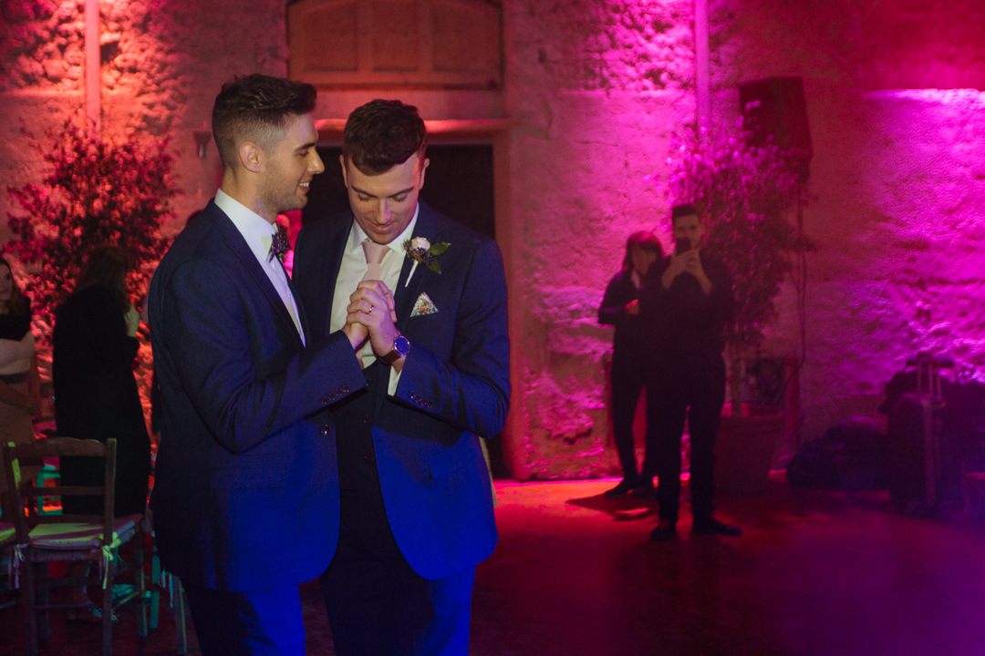 Same sex couple share their first dance on their wedding day