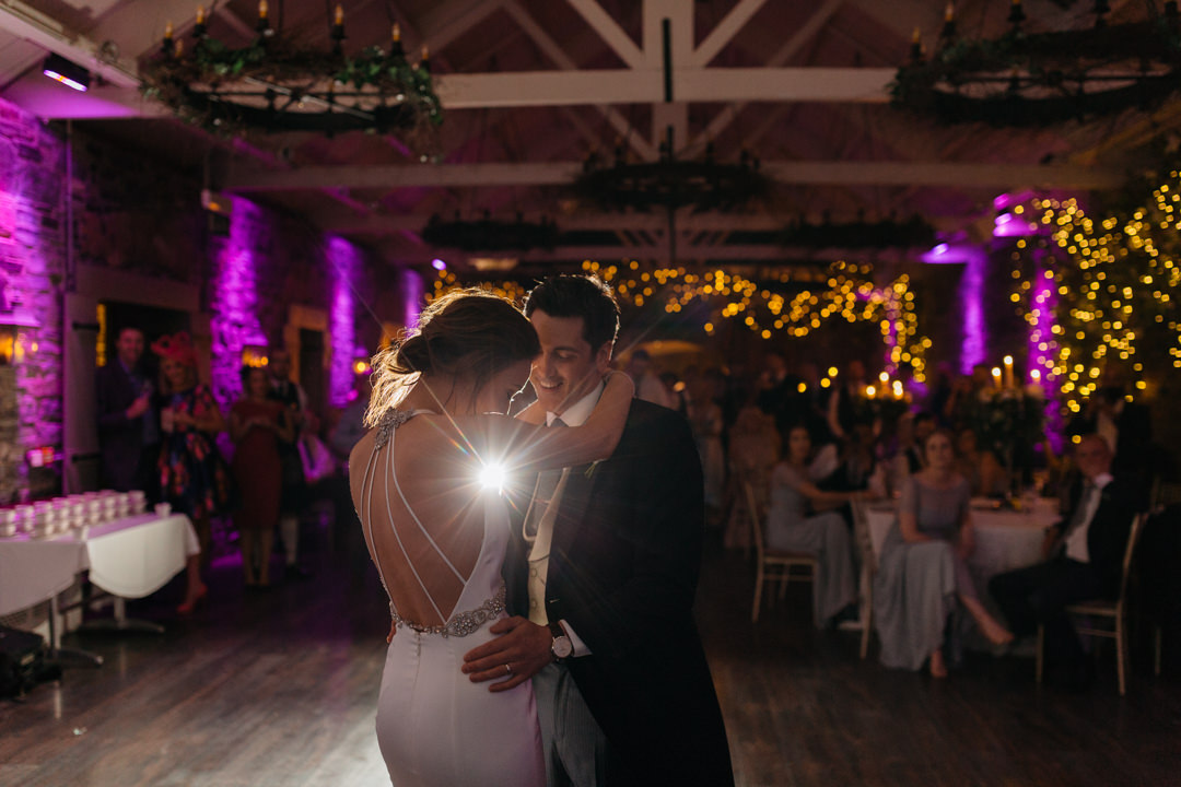 Bride and groom have their first dance at Ballymagarvey wedding venue